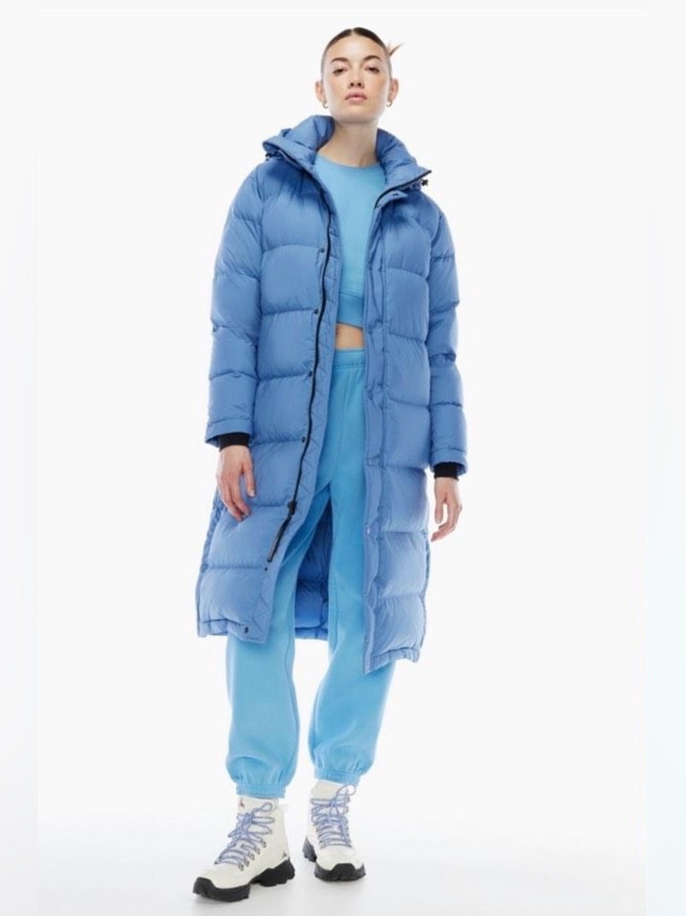 Aritzia "The Super Puff" long coat in light blue.